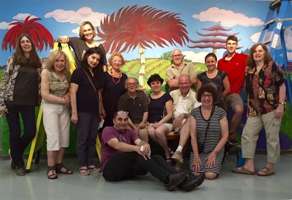 Continuing "Time Off," Gallery RIVAA members group show. RIVAA Gallery artists gather for a photo with MST&DA Executive Director, Kristi Towey. Scenic design by RIVAA.